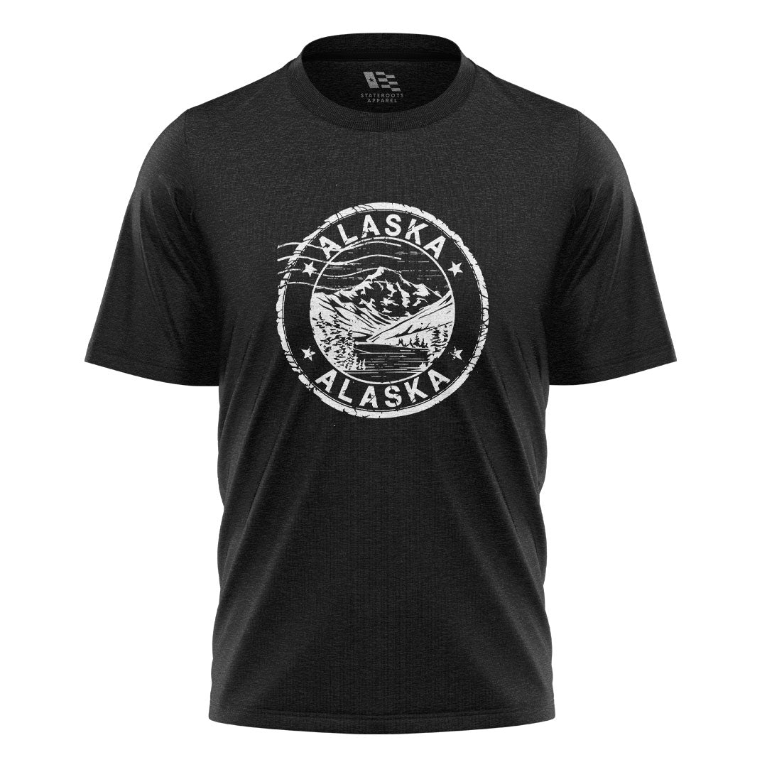 Alaska Distressed Stamp Mountain Badge - Black flatlay